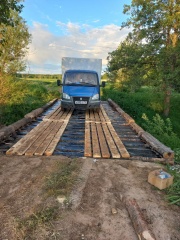 Андрей Забаев проверил выполнение работ по ремонту моста в районе деревни Рохмала