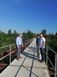 Андрей Забаев проверил качество работ по обустройству пешеходного моста через реку Лахость